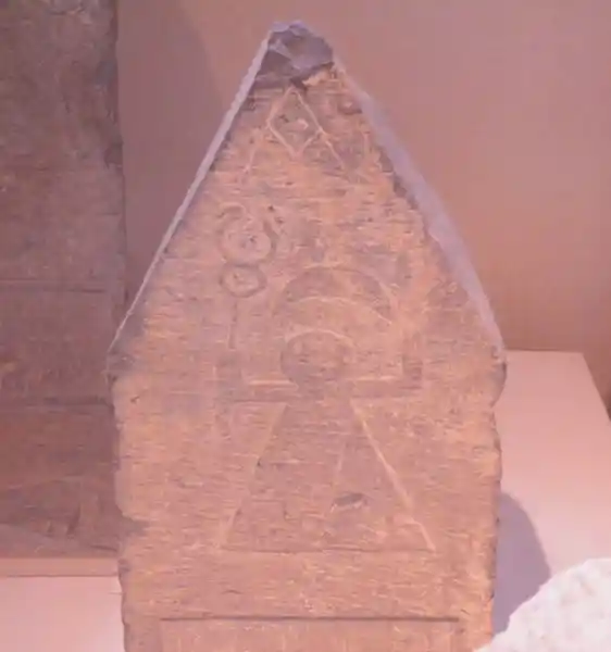 Caduceus, sign of tanit and raised hand